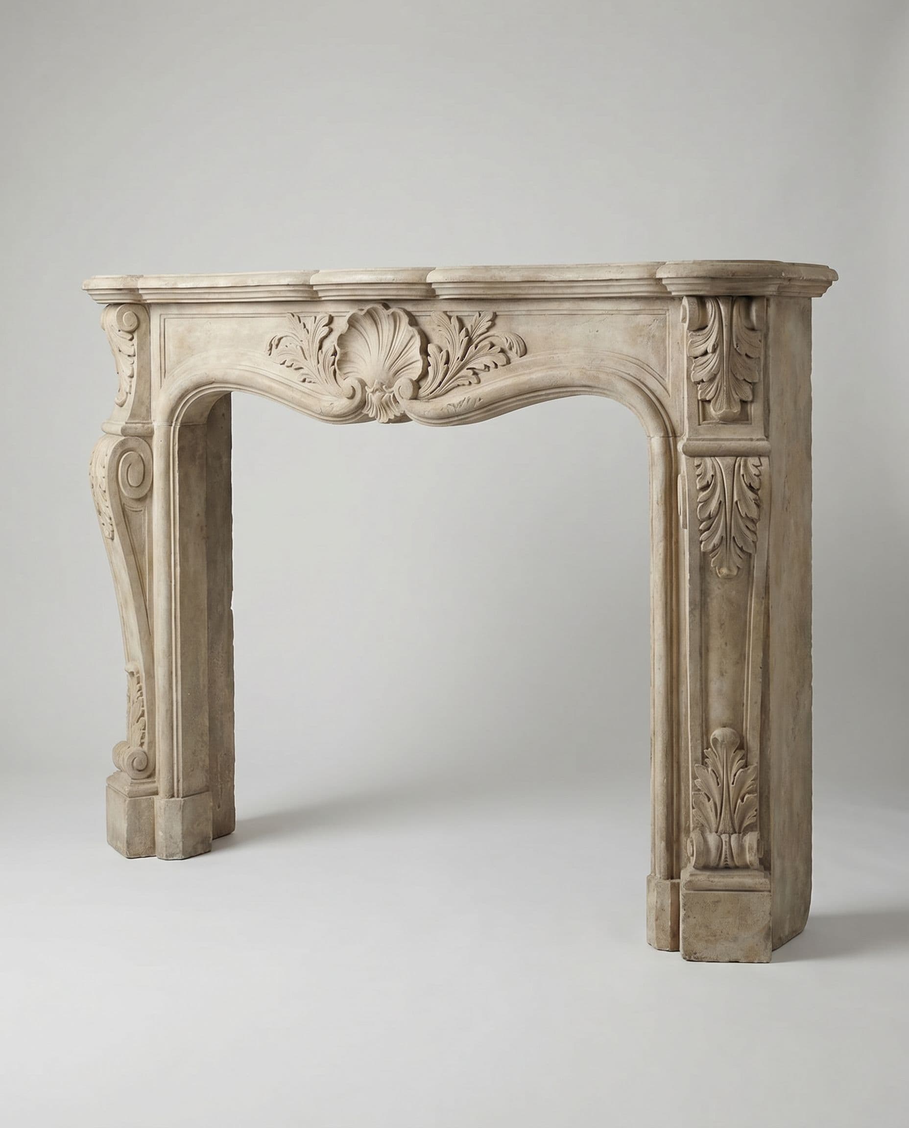 Hand-carved French limestone fireplace mantel